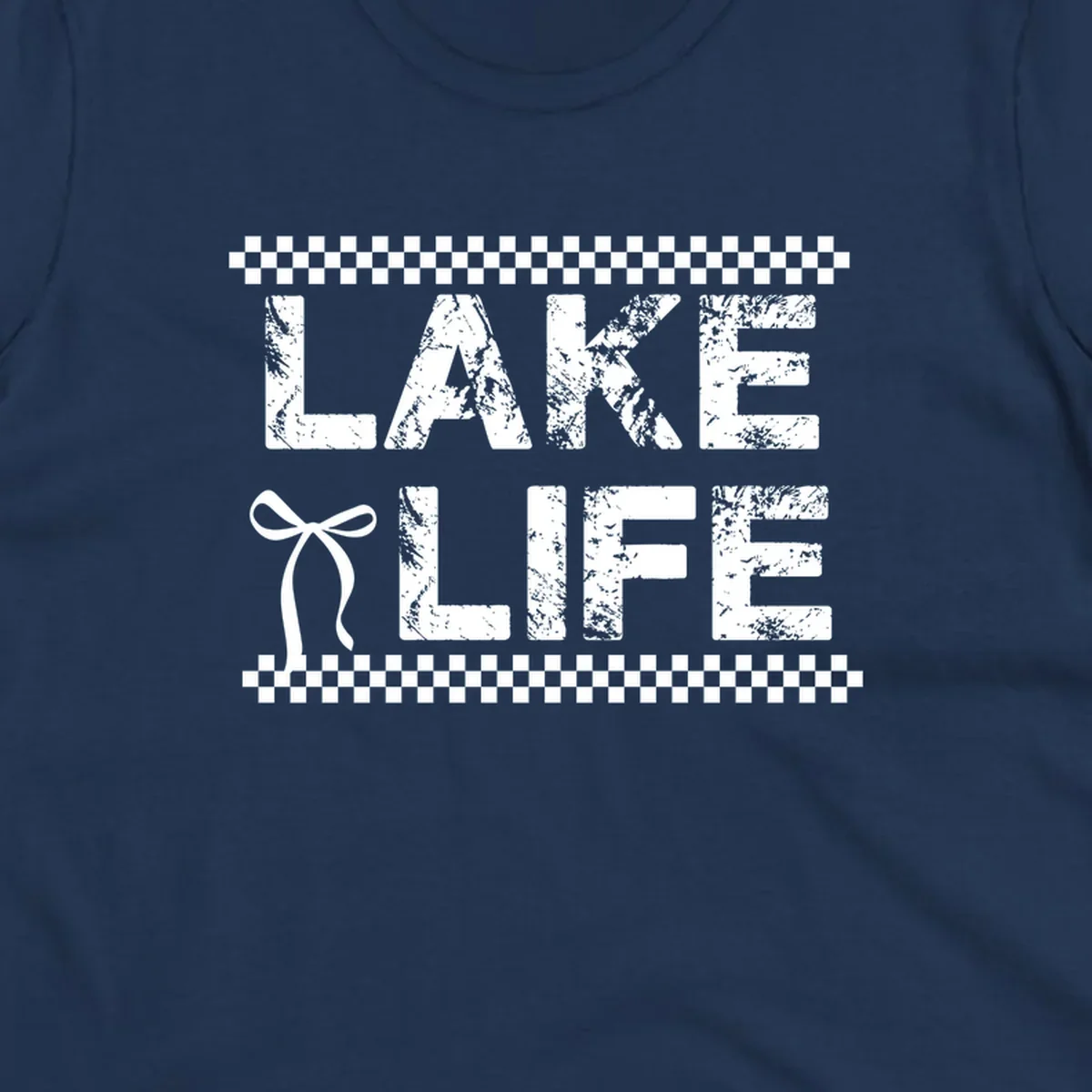 Lake Life text with bow accent and checkerboard border, distressed font.