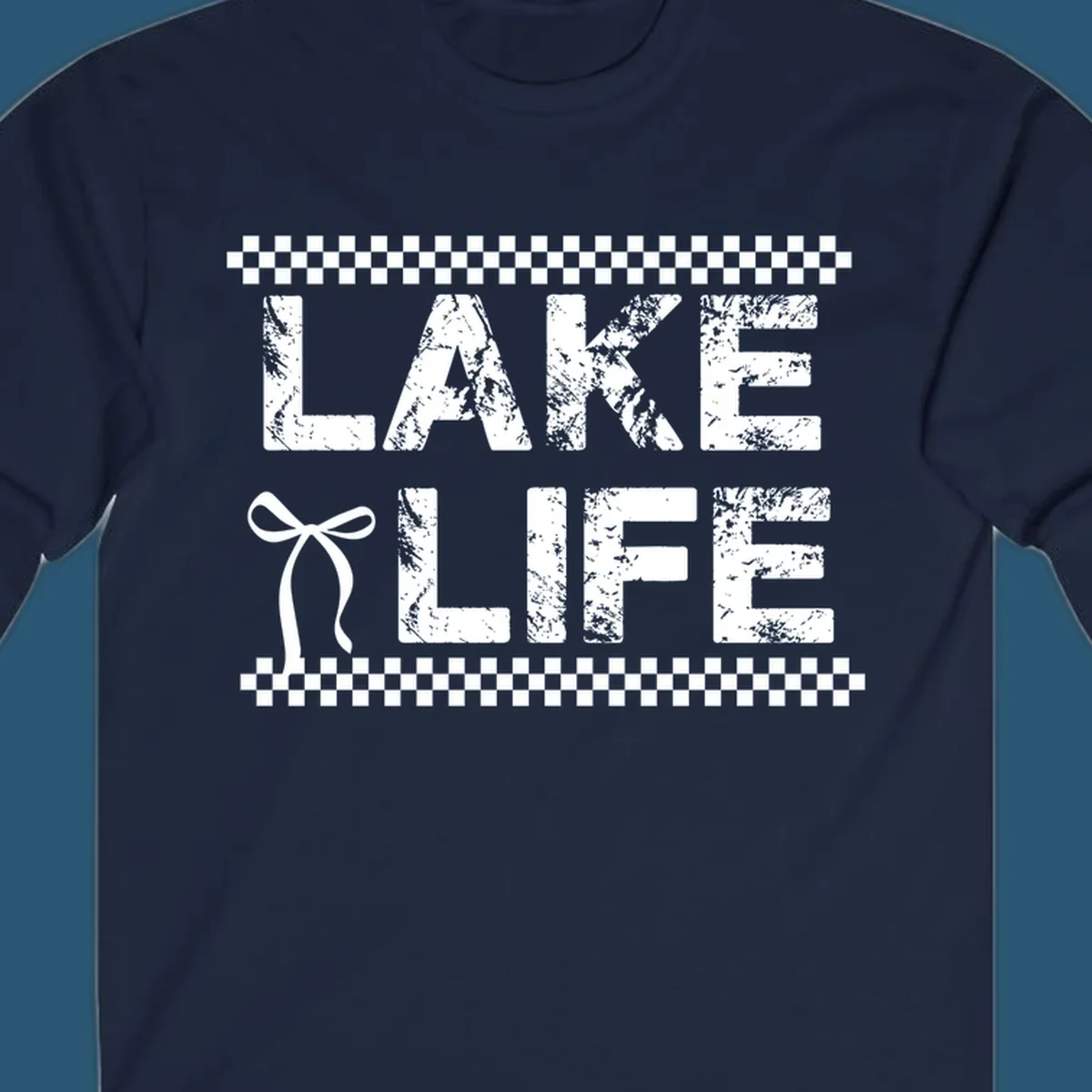 Lake Life text with bow accent and checkerboard border, distressed font.