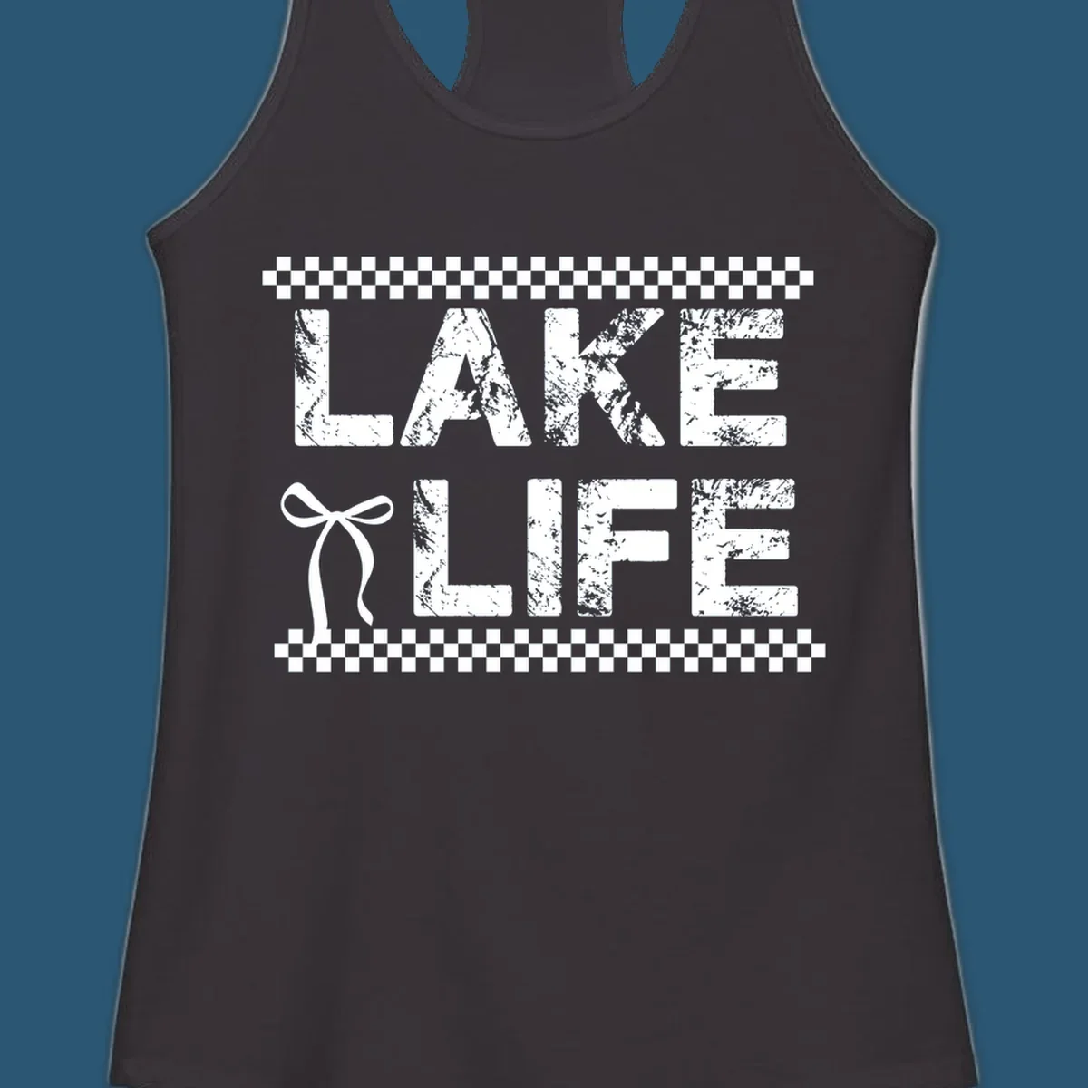 Lake Life text with bow accent and checkerboard border, distressed font.