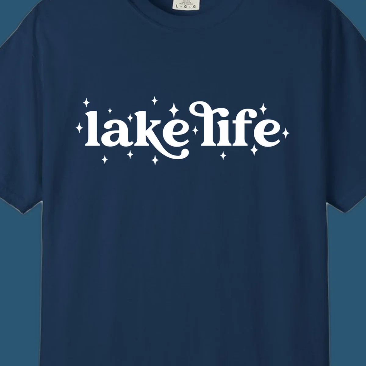 Lake life text with sparkles, white on black and navy on white.