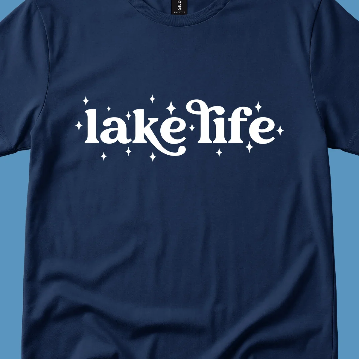 Lake life text with sparkles, white on black and navy on white.