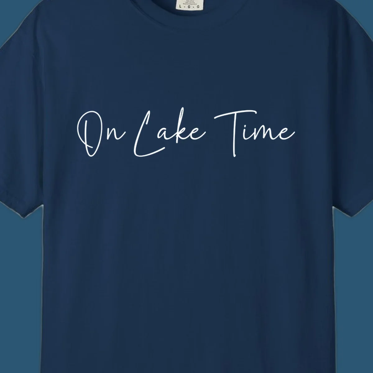 On Lake Time script text design in white and navy.
