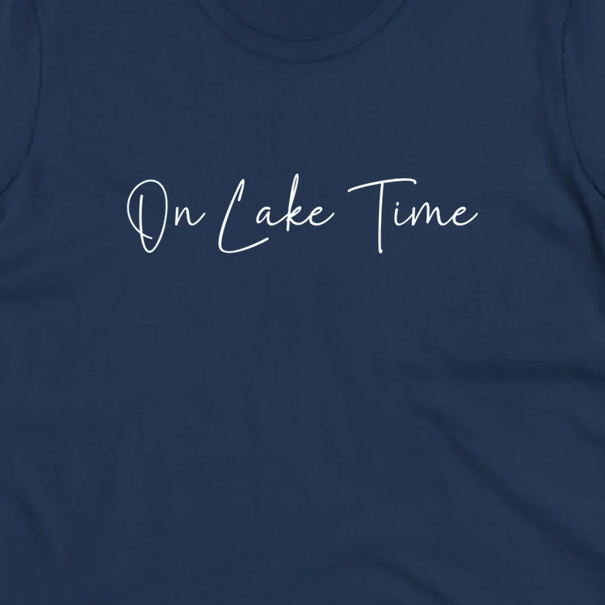 On Lake Time script text design in white and navy.