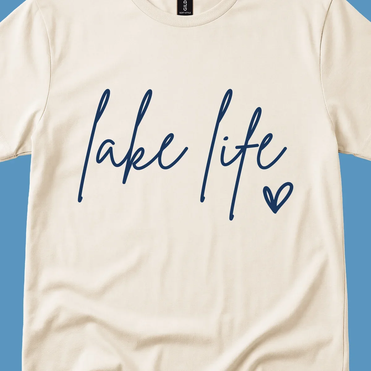 Lake life script text with a heart icon.