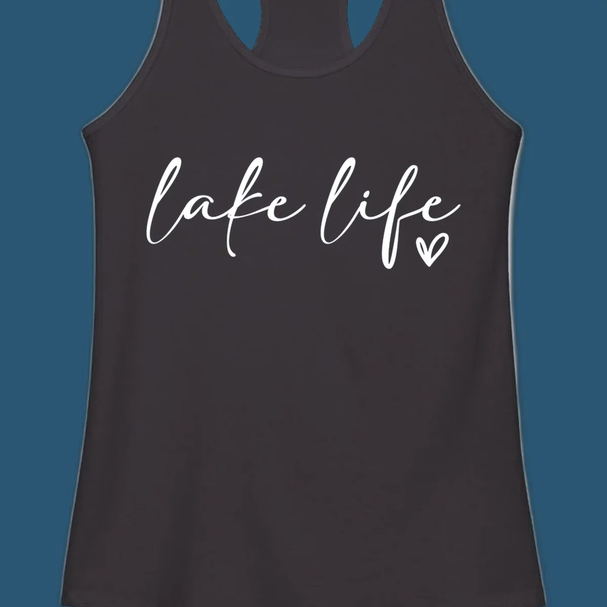 White script text reading 'lake life' with a small heart icon, on a black background.