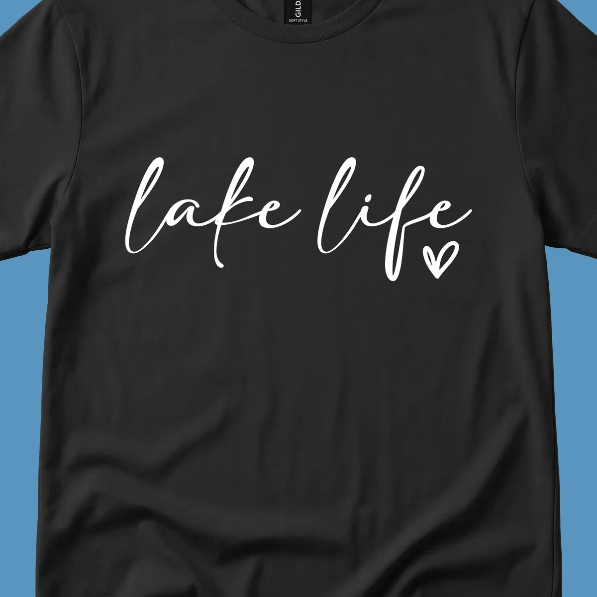 White script text reading 'lake life' with a small heart icon, on a black background.
