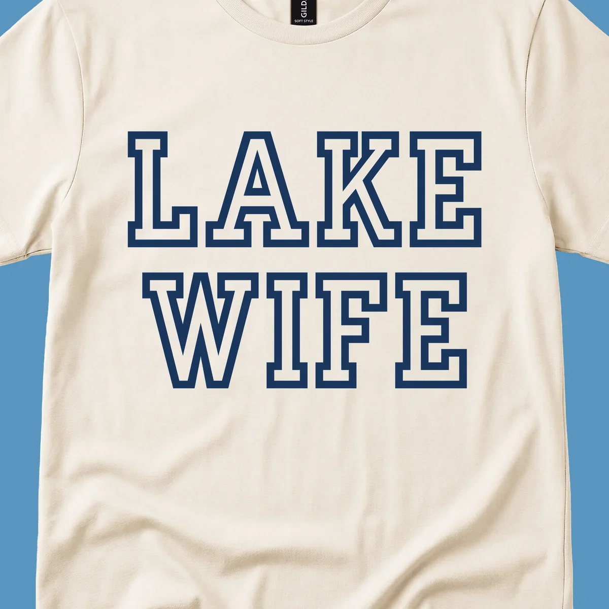 Lake Wife text in collegiate font, navy and white colors, on dark and light backgrounds.