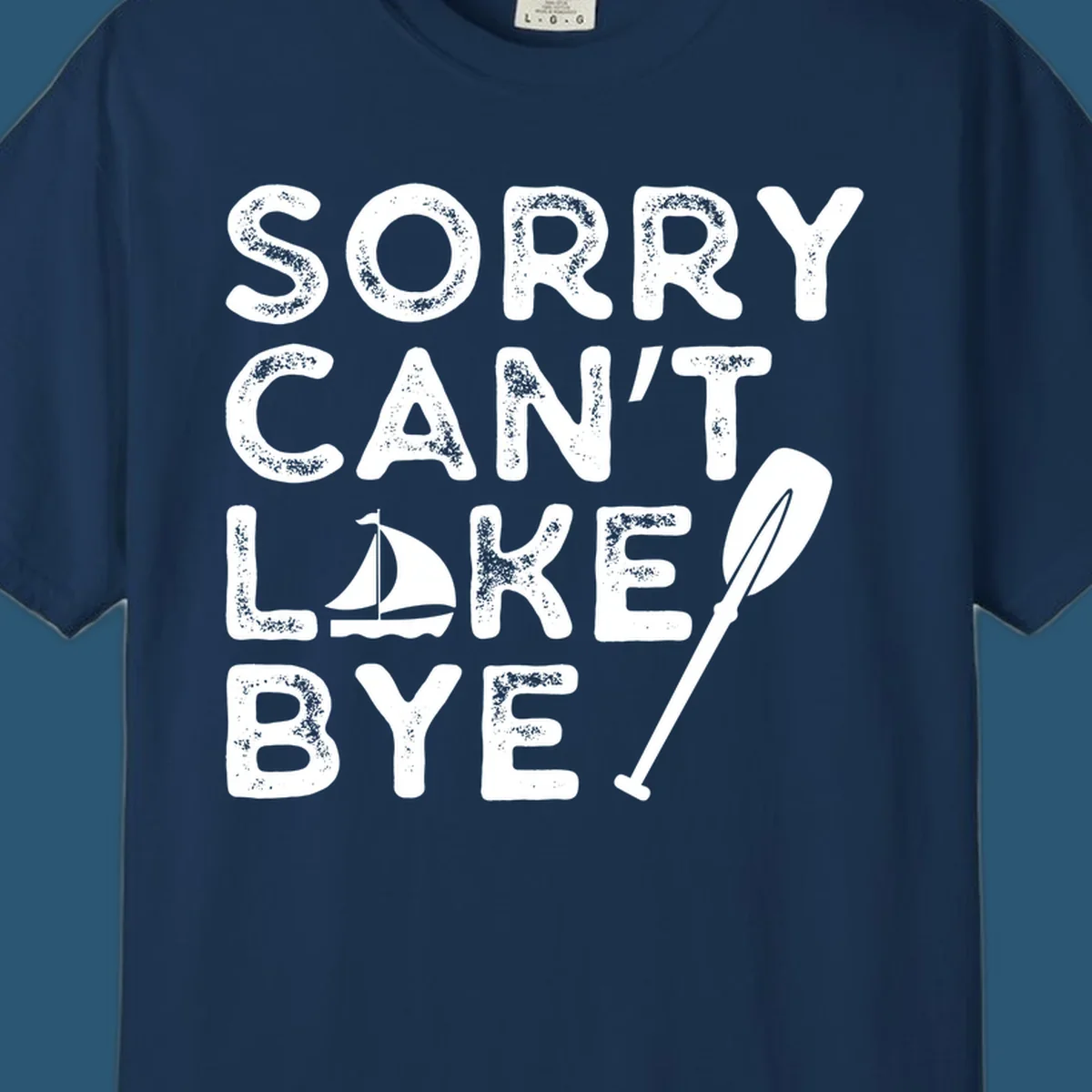 Sorry Can't Lake Bye text with sailboat and paddle graphic