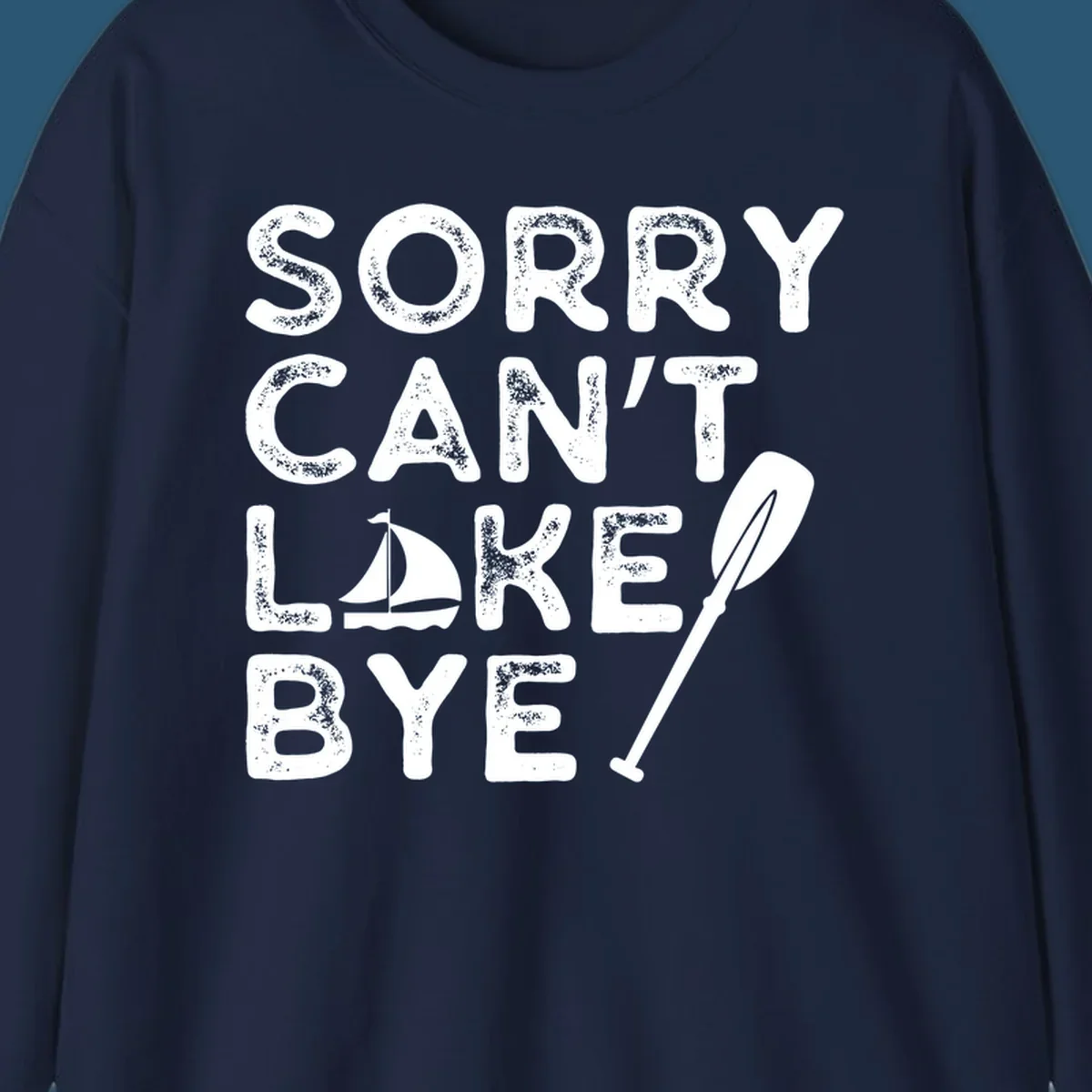 Sorry Can't Lake Bye text with sailboat and paddle graphic