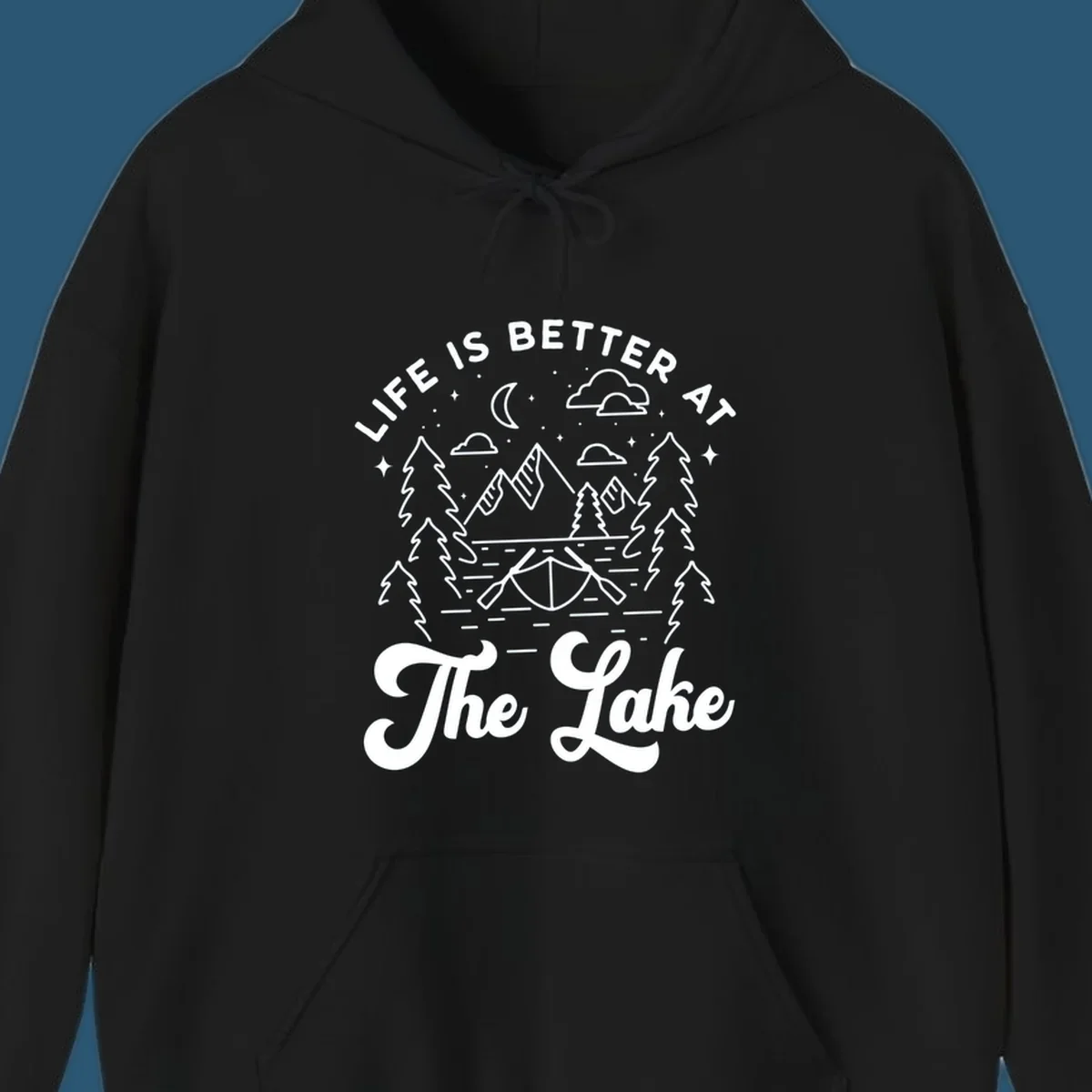 Lake life graphic with mountains, canoe, moon, and text 'Life Is Better At The Lake'.