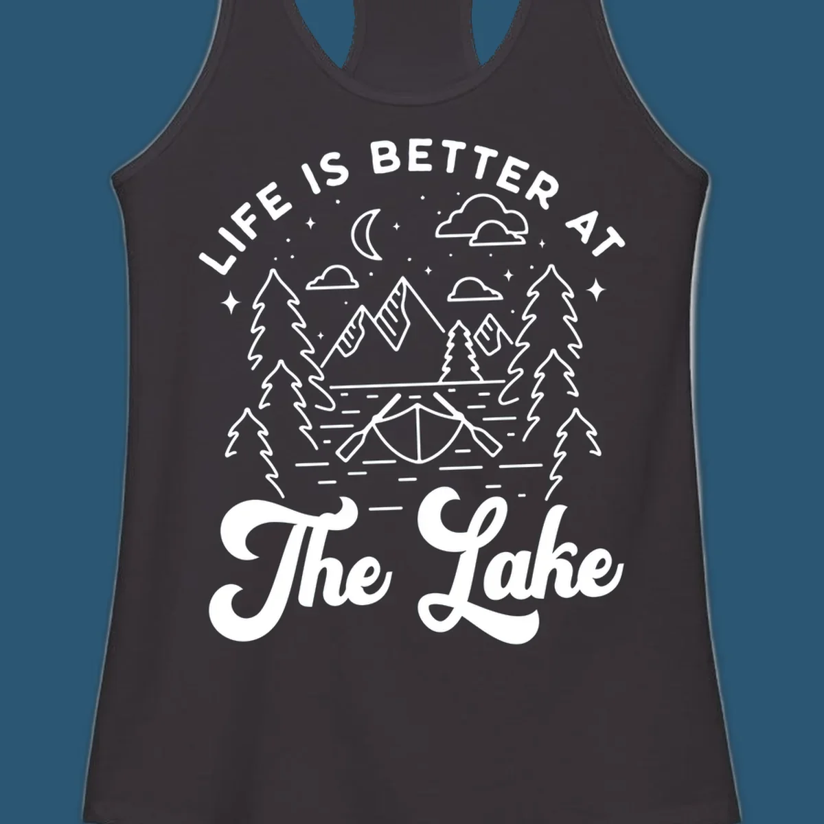 Lake life graphic with mountains, canoe, moon, and text 'Life Is Better At The Lake'.