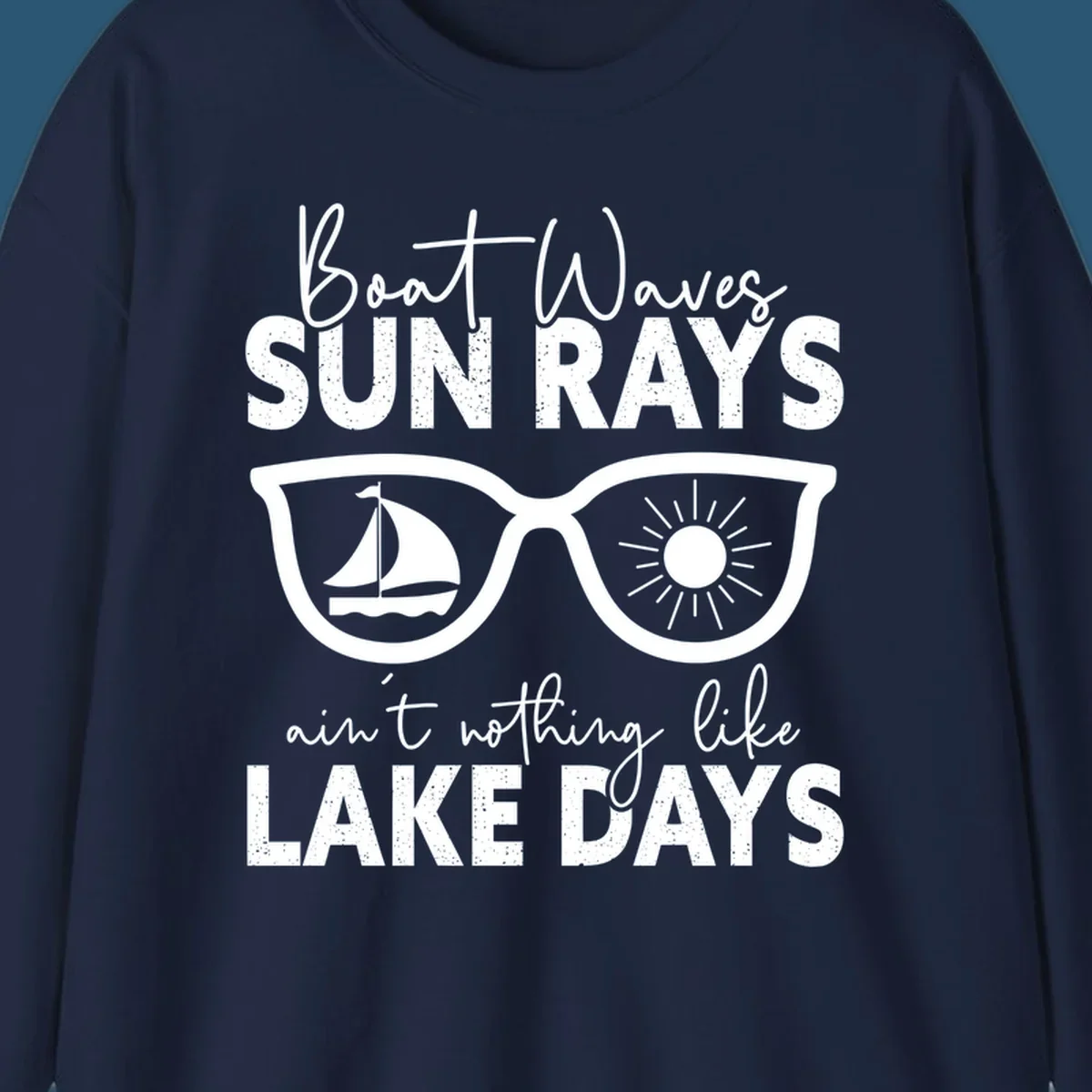 Lake days sunglasses with sailboat and sun rays, text reads Boat Waves Sun Rays Ain't Nothing Like Lake Days.