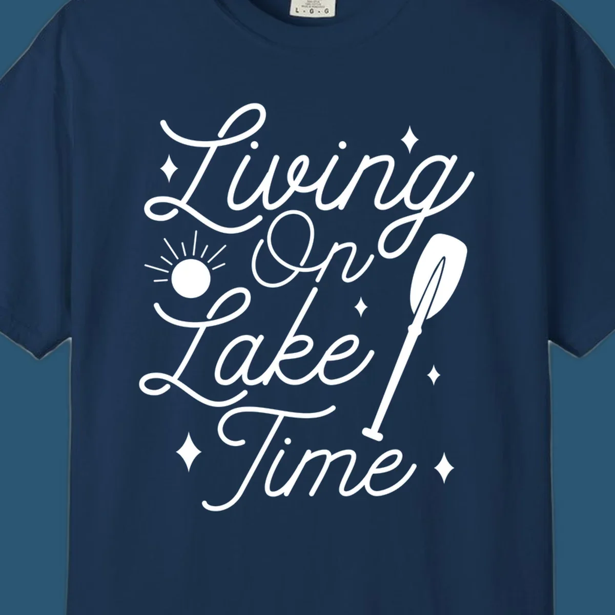 Living on lake time text with sun and paddle illustration.