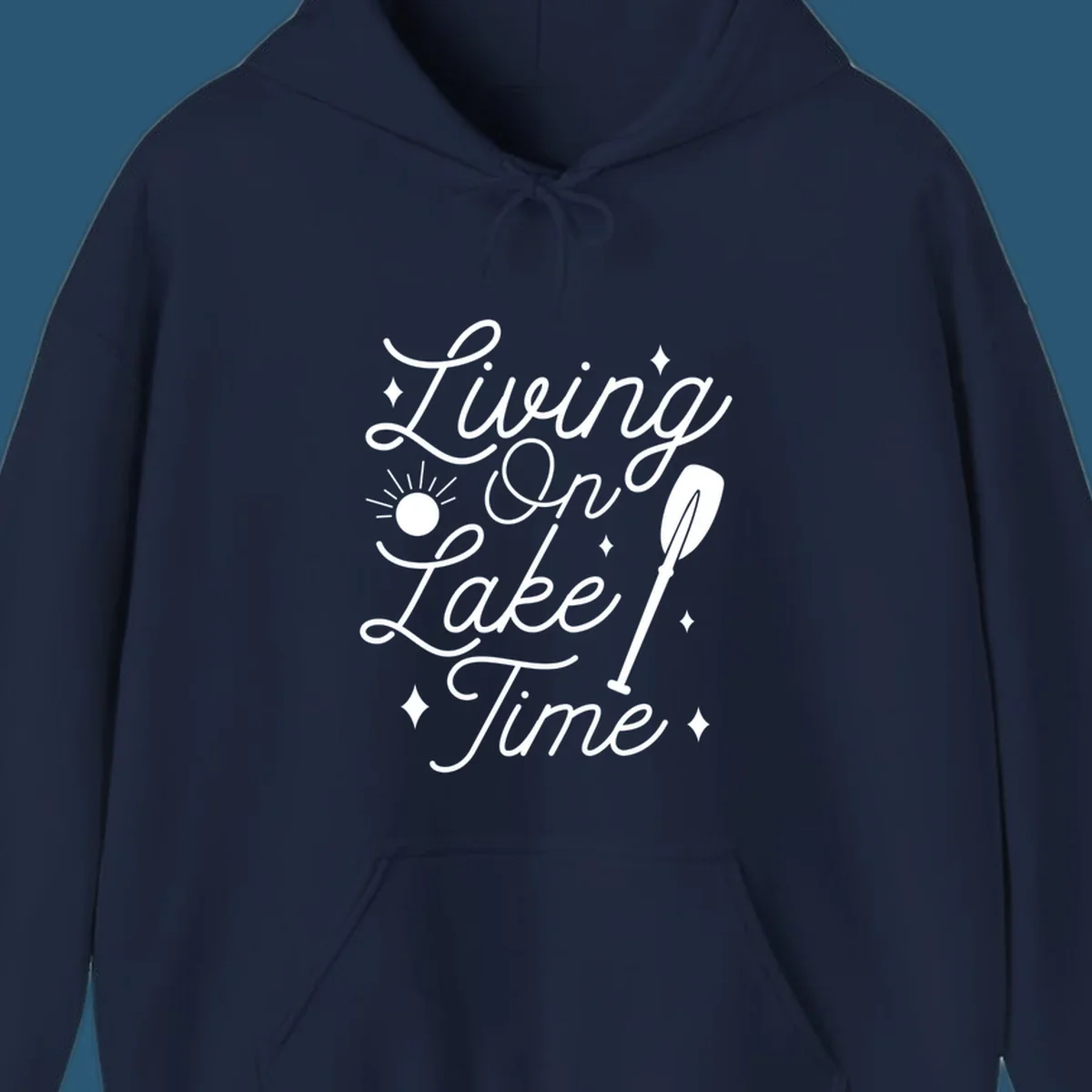 Living on lake time text with sun and paddle illustration.