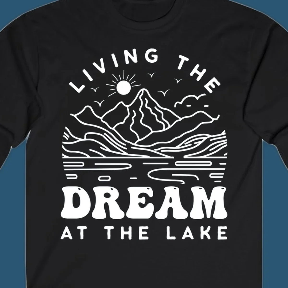 Living the dream at the lake scenic mountain landscape with sun and birds artwork.