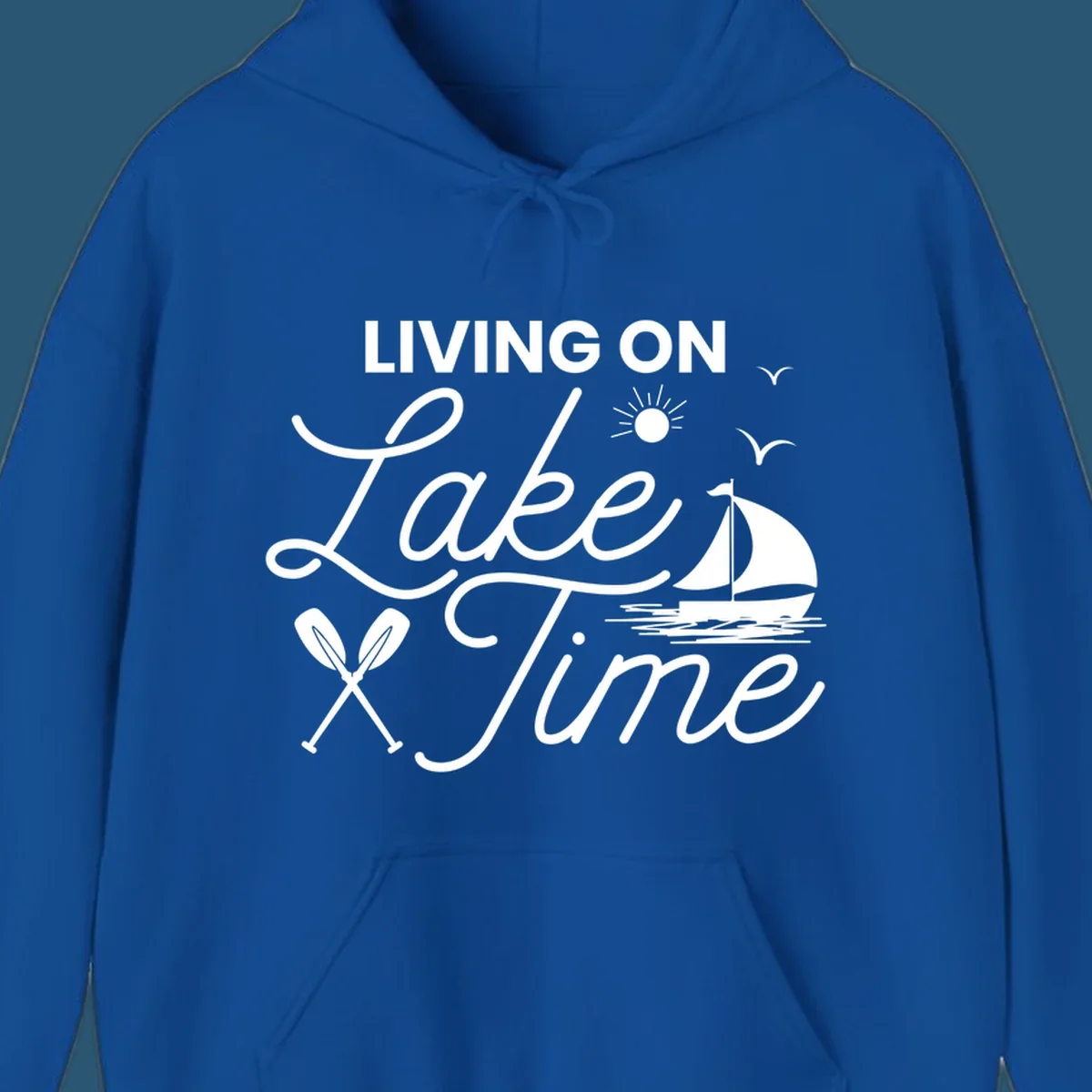 Living on lake time text with sailboat, sun, birds, and oars.