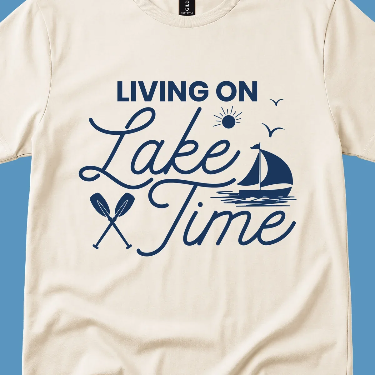 Living on lake time text with sailboat, sun, birds, and oars.
