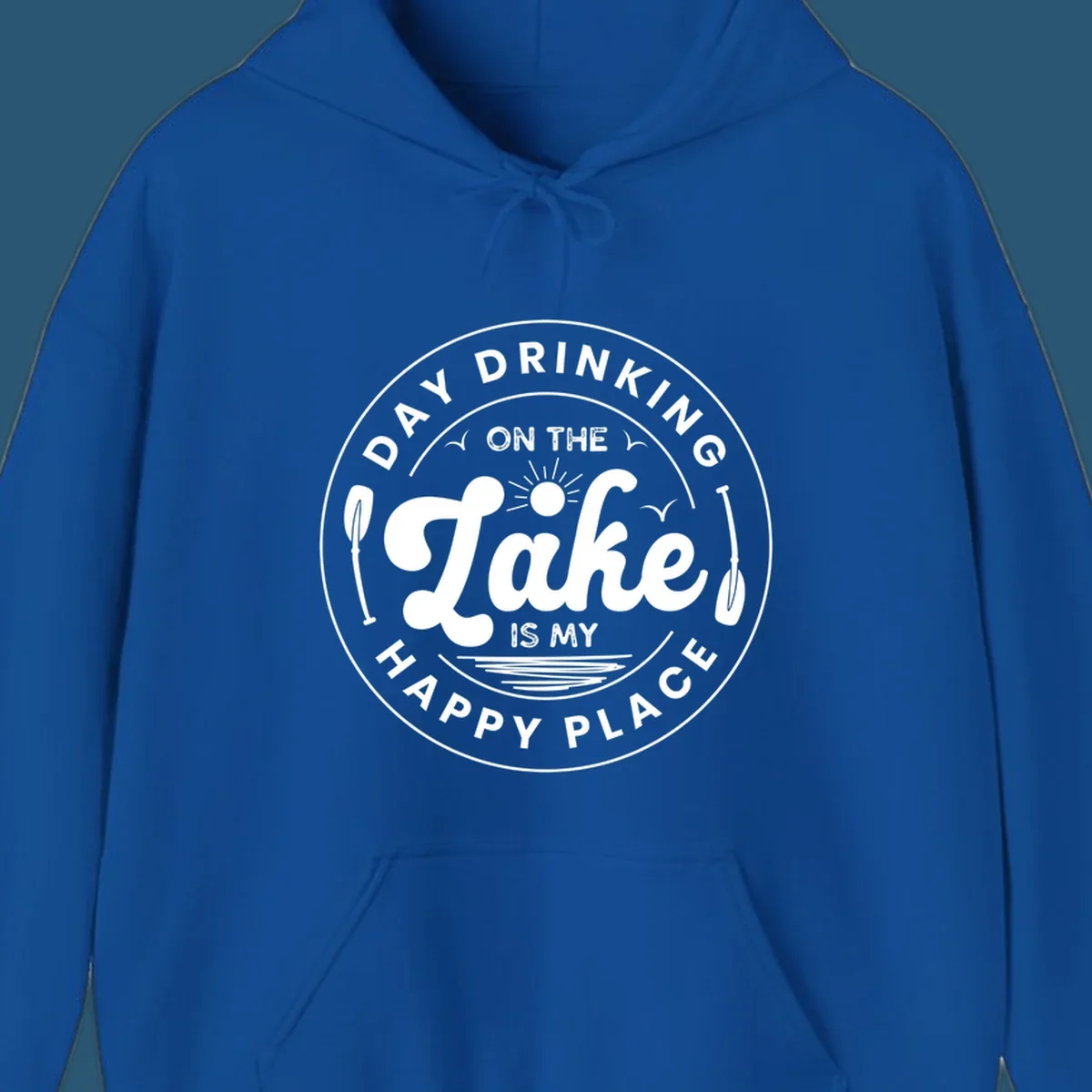 Circular badge design with text 'Day Drinking On The Lake Is My Happy Place' and lake-themed graphics.