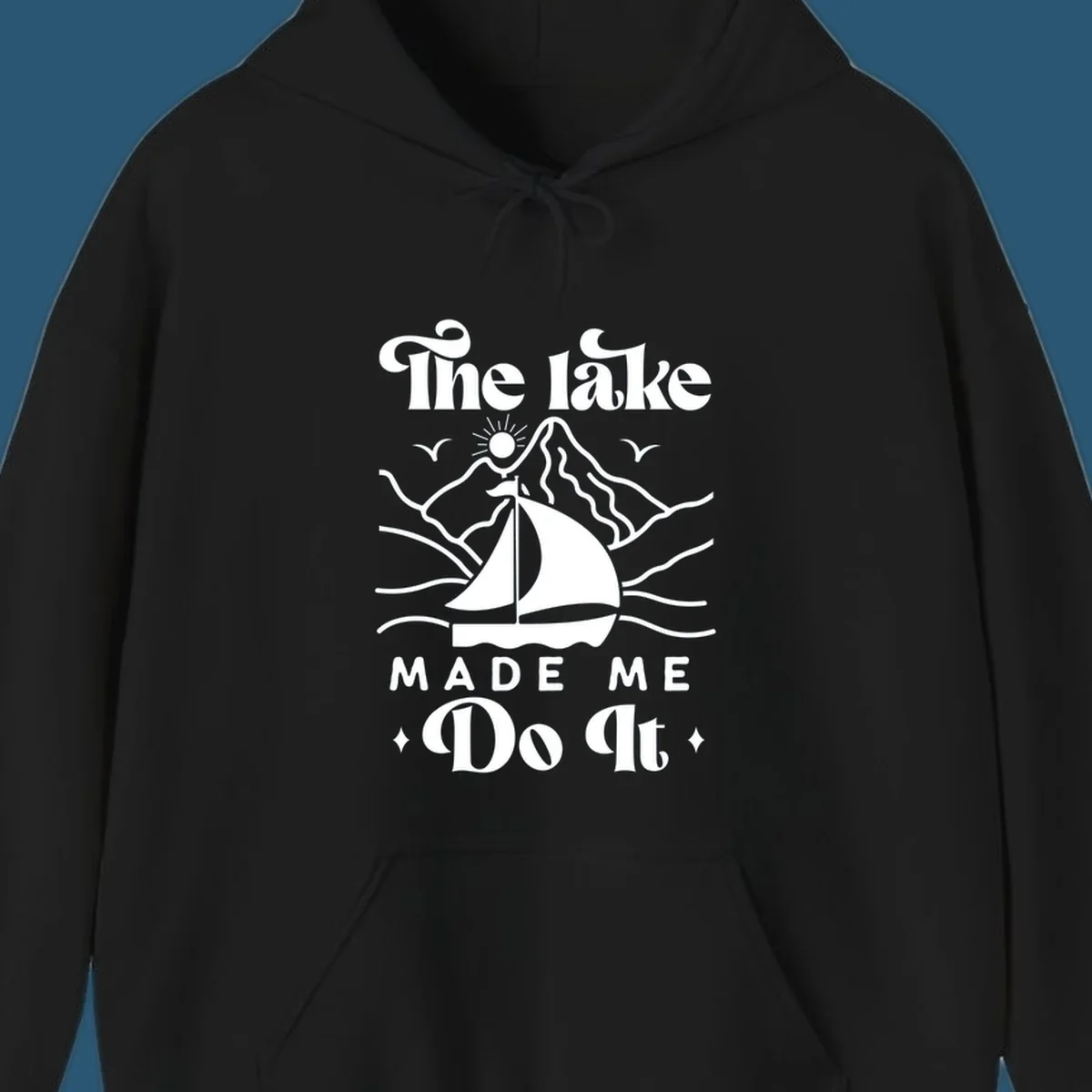 The lake Made Me Do It sailboat illustration with mountains and birds, lake-made-me-do-it concept.