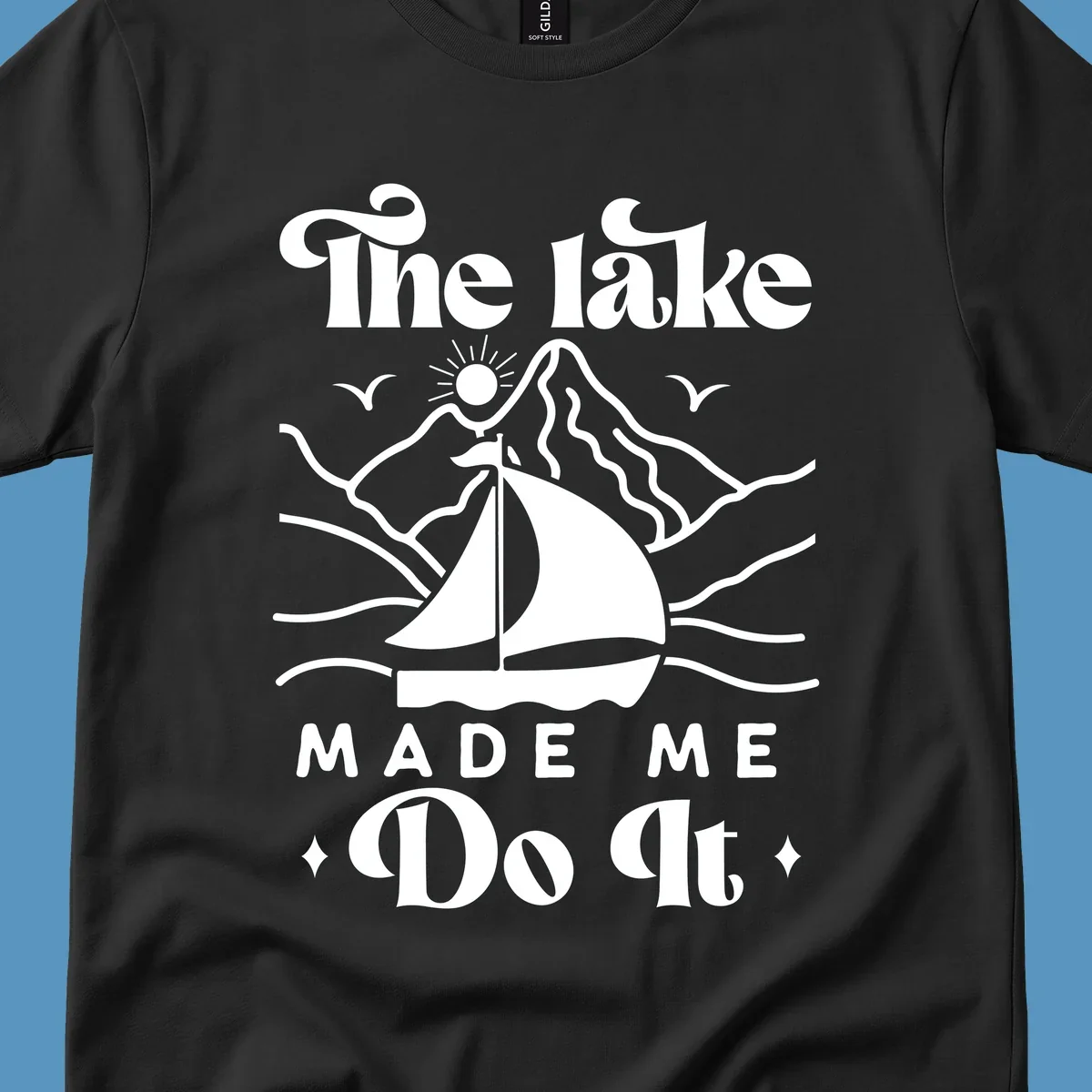 The lake Made Me Do It sailboat illustration with mountains and birds, lake-made-me-do-it concept.