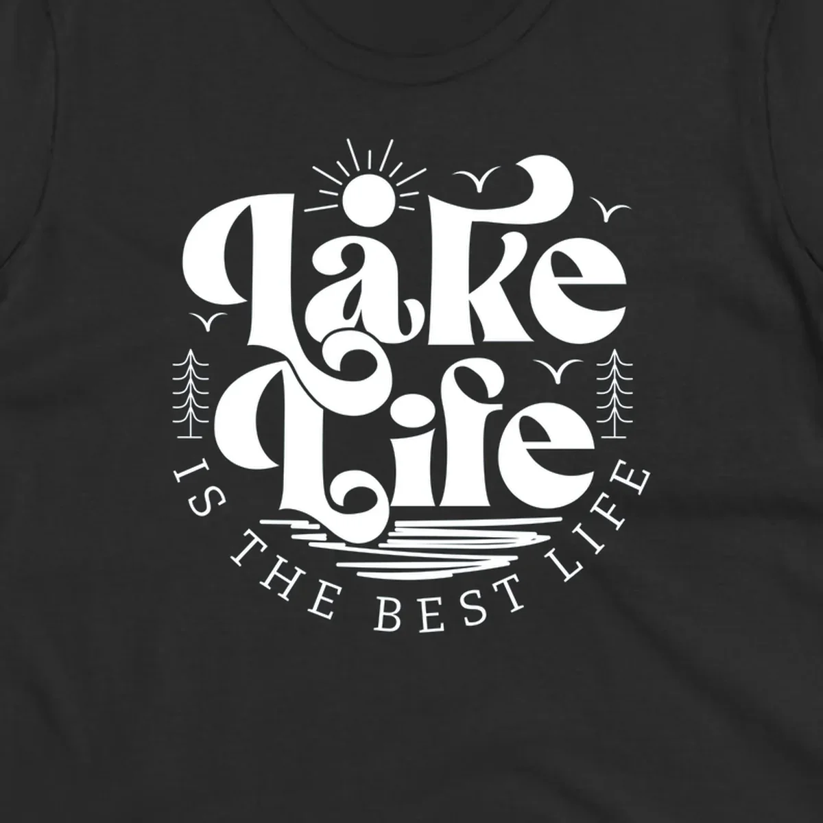 Lake life is the best life typography design with sun, birds, trees, and water elements.