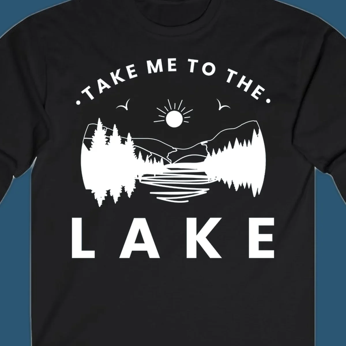 Take me to the lake mountains design with text and scenic illustration.