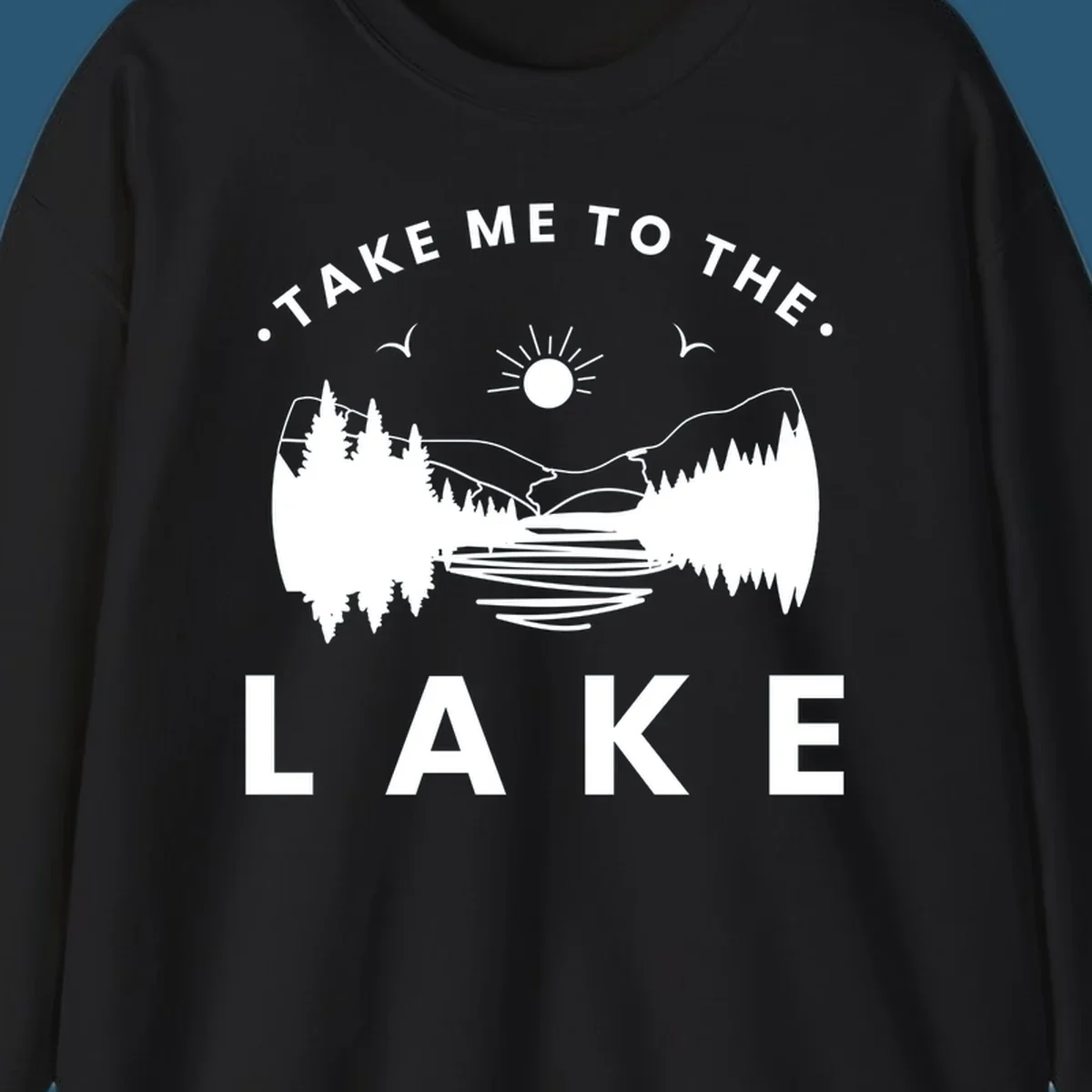 Take me to the lake mountains design with text and scenic illustration.
