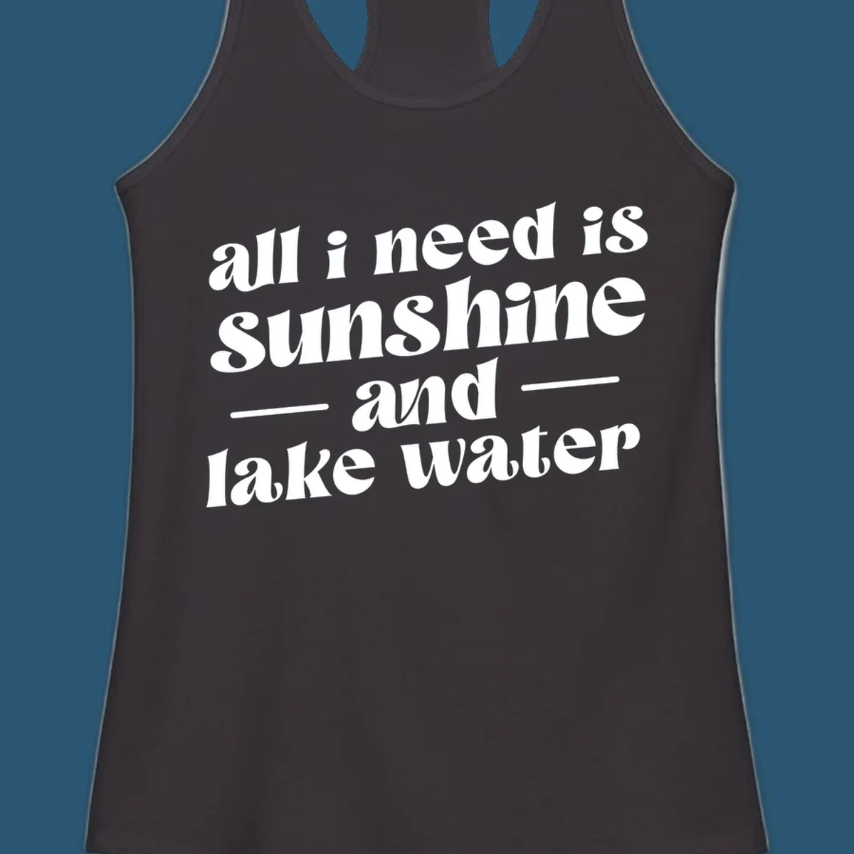 Text design 'all i need is sunshine and lake water' in a retro font, perfect for lake days.