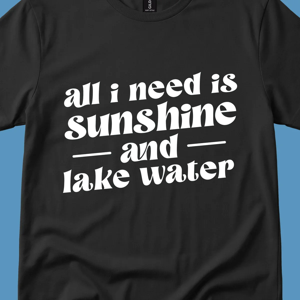 Text design 'all i need is sunshine and lake water' in a retro font, perfect for lake days.
