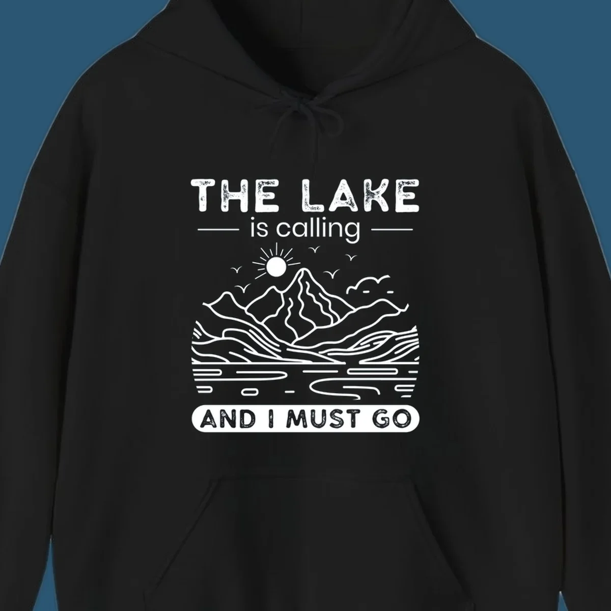 The Lake is Calling And I Must Go scenic nature design with mountains and lake.