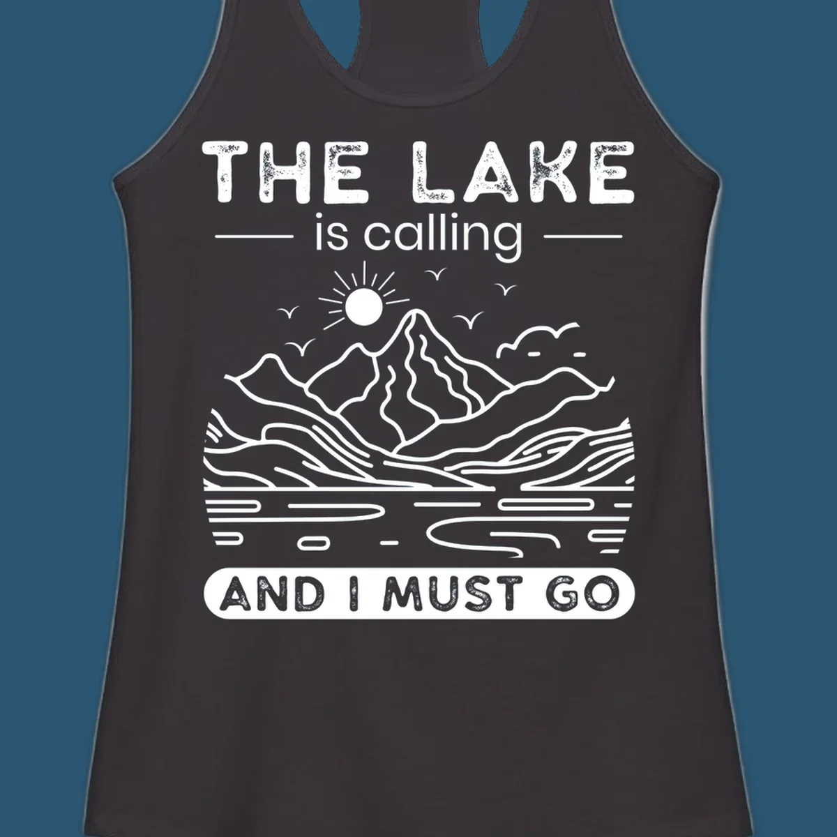 The Lake is Calling And I Must Go scenic nature design with mountains and lake.