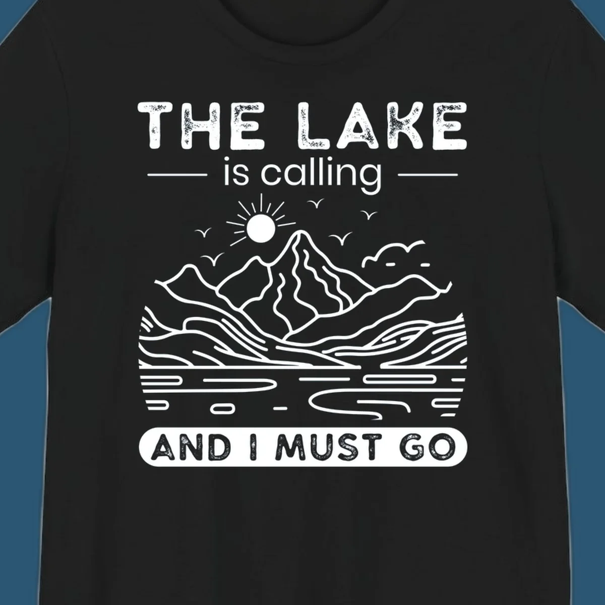 The Lake is Calling And I Must Go scenic nature design with mountains and lake.