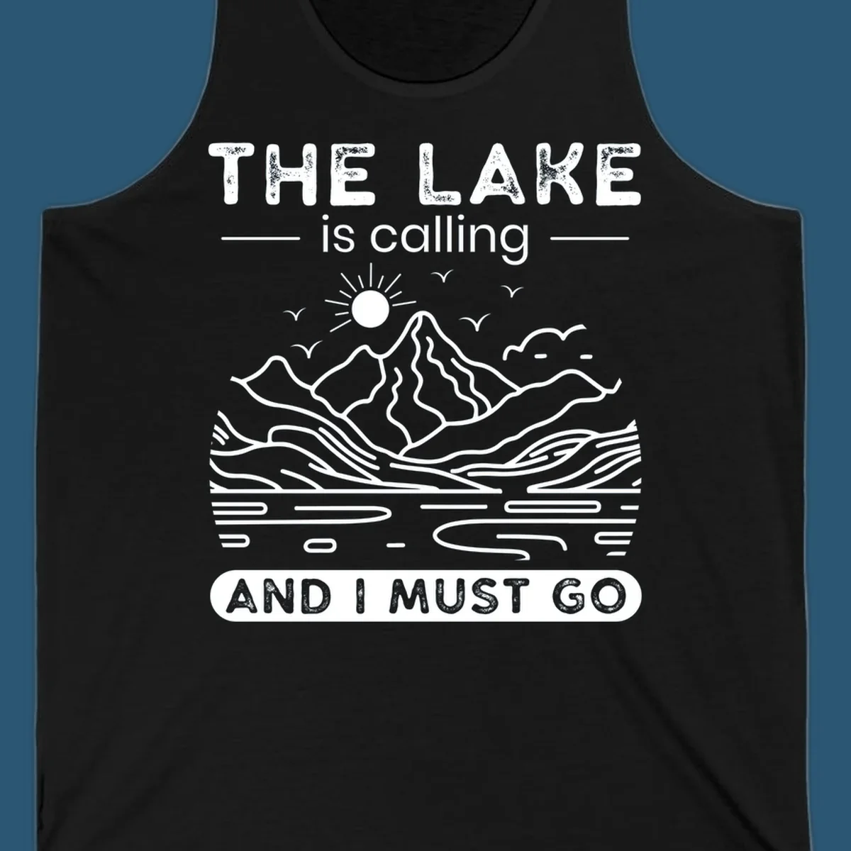 The Lake is Calling And I Must Go scenic nature design with mountains and lake.