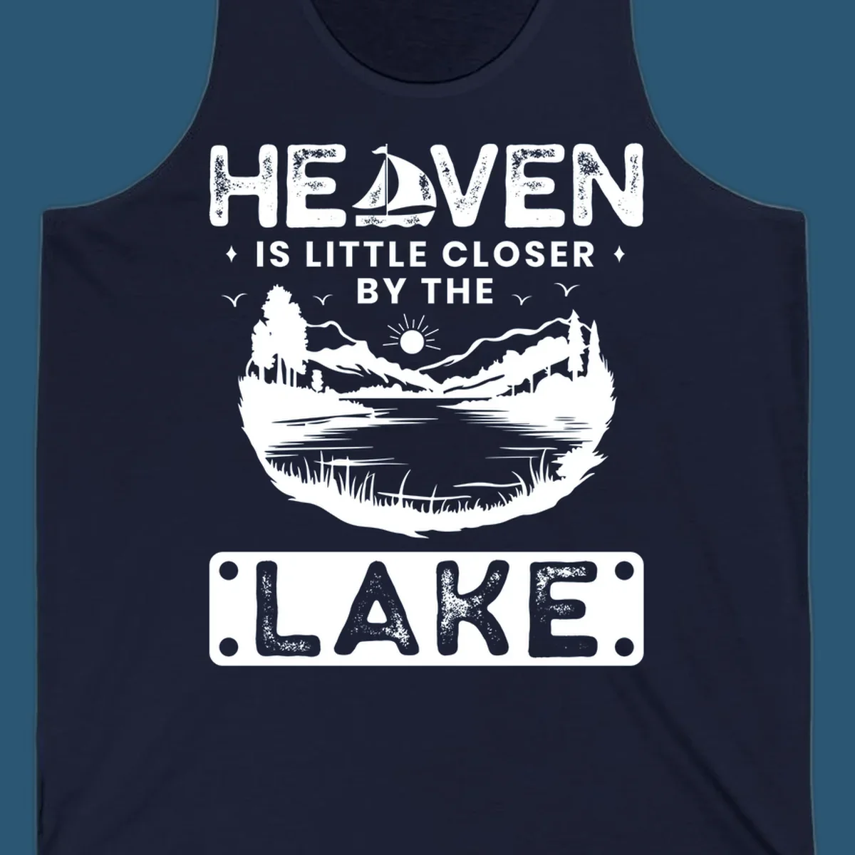 Heaven Is Little Closer By The Lake scenic design with lake, mountains, and sailboat.