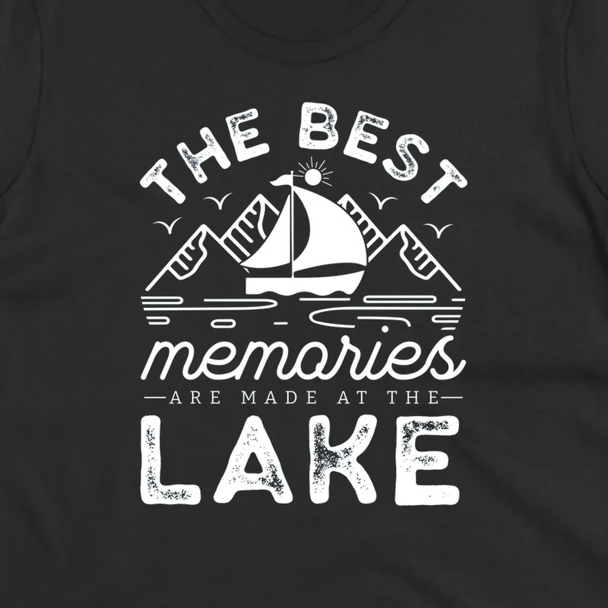 The Best Memories Are Made At The Lake design with mountains, sailboat, and text.