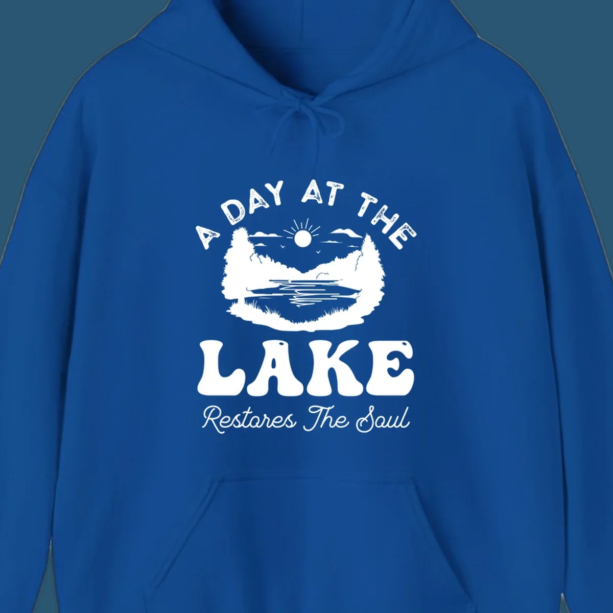 A day at the lake restores the soul graphic with lake scene and text