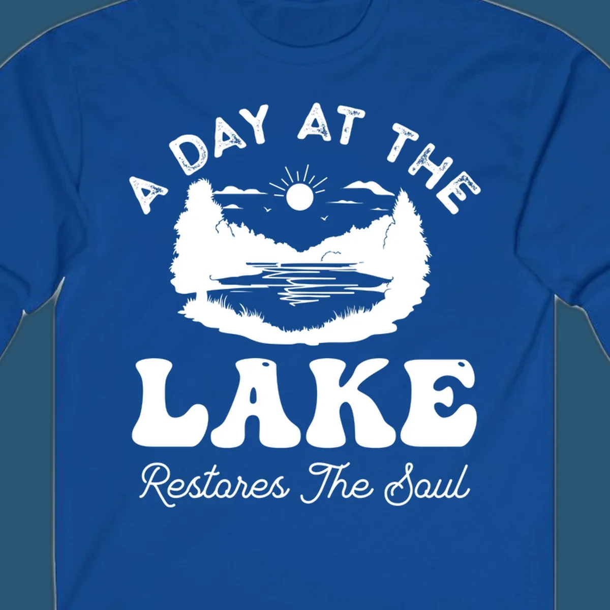 A day at the lake restores the soul graphic with lake scene and text