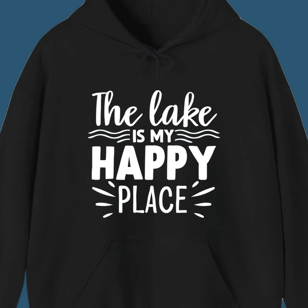 The lake is my happy place text design with wave and sun ray graphics.
