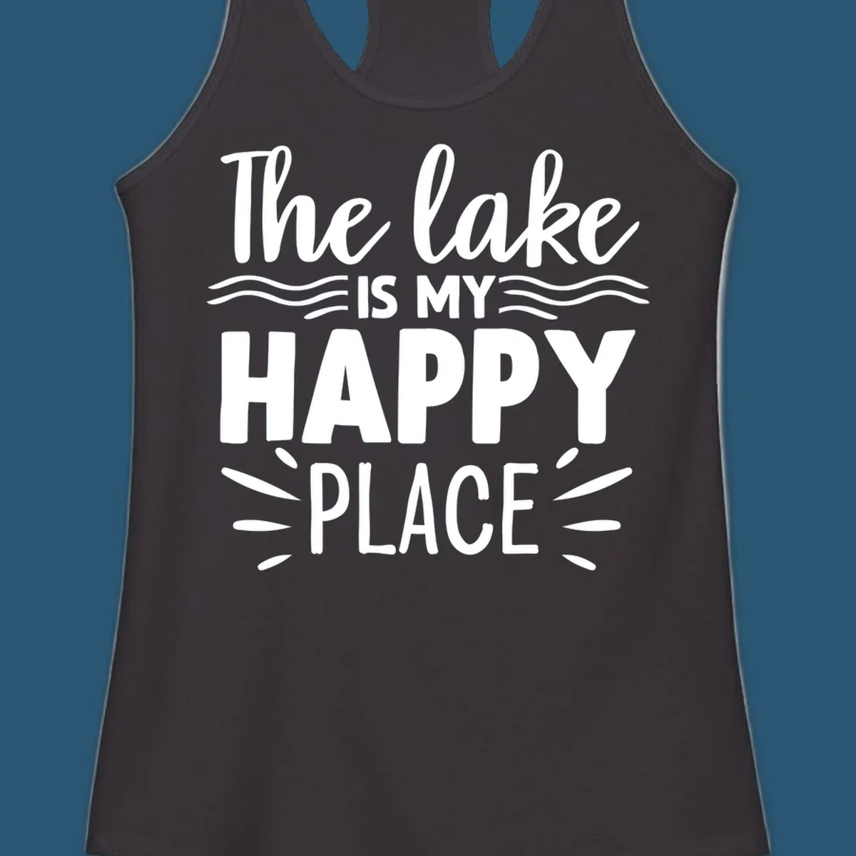 The lake is my happy place text design with wave and sun ray graphics.