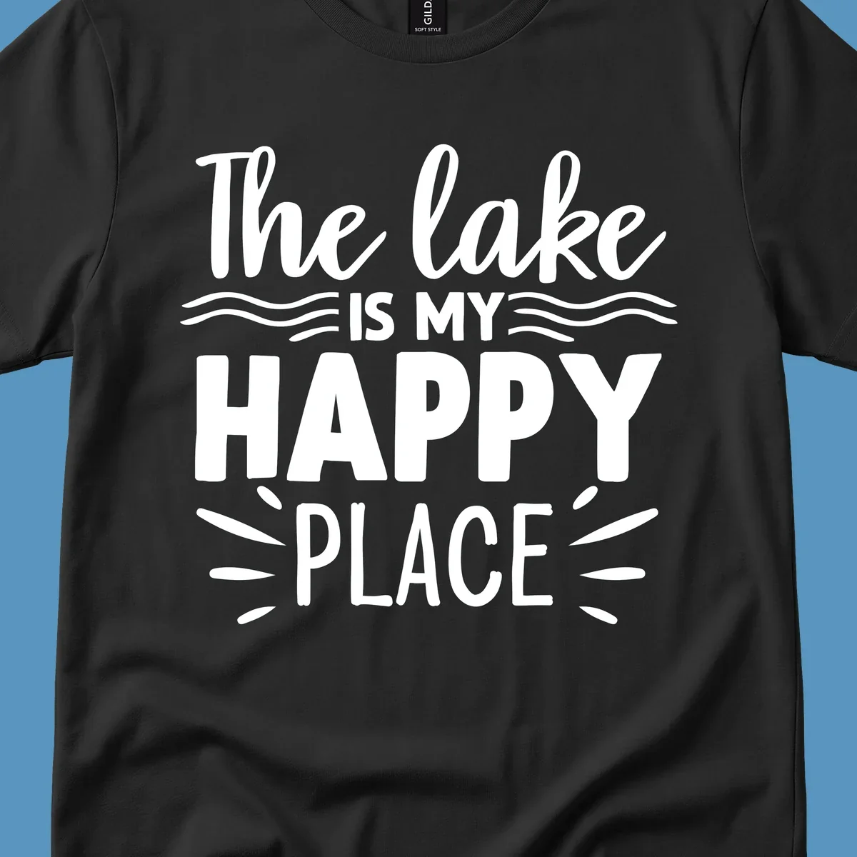 The lake is my happy place text design with wave and sun ray graphics.