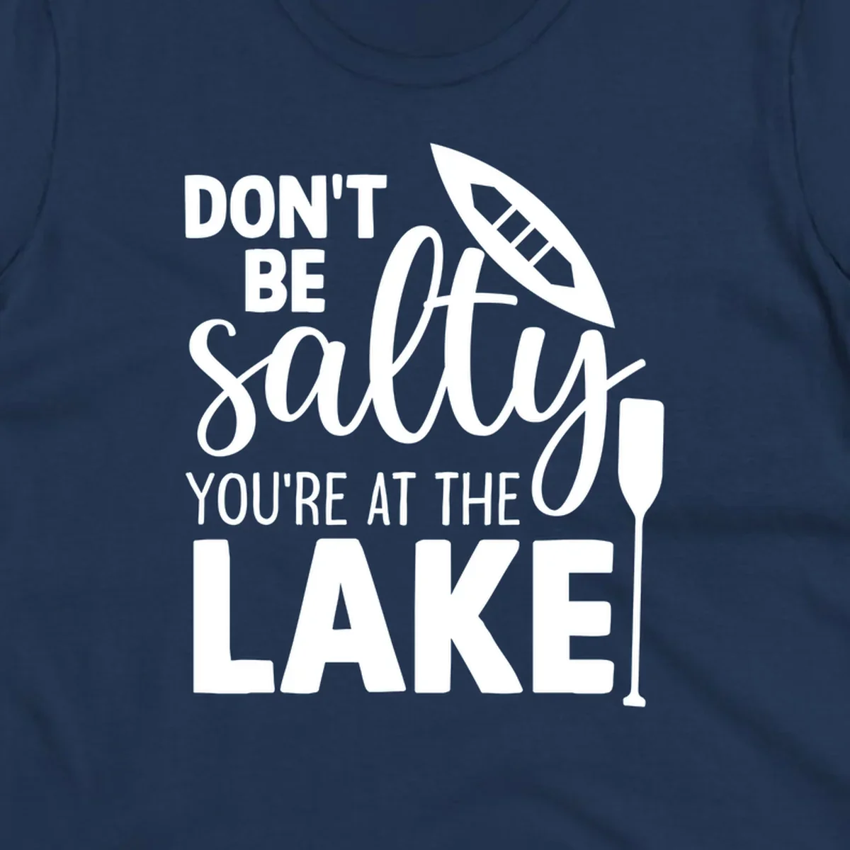Don't be salty you're at the lake text with canoe and oar graphic.