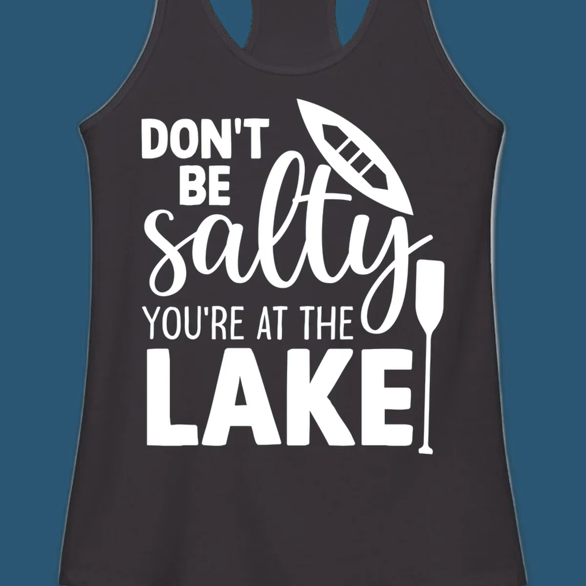Don't be salty you're at the lake text with canoe and oar graphic.