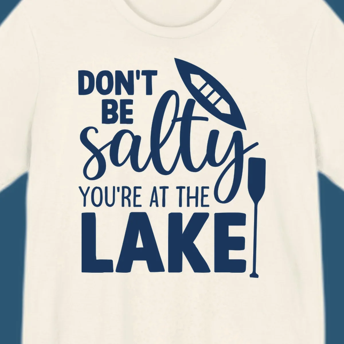 Don't be salty you're at the lake text with canoe and oar graphic.