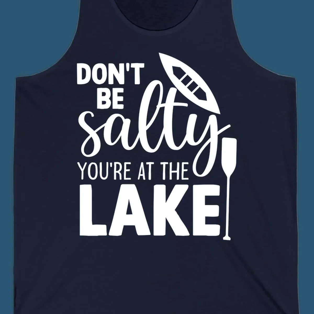 Don't be salty you're at the lake text with canoe and oar graphic.
