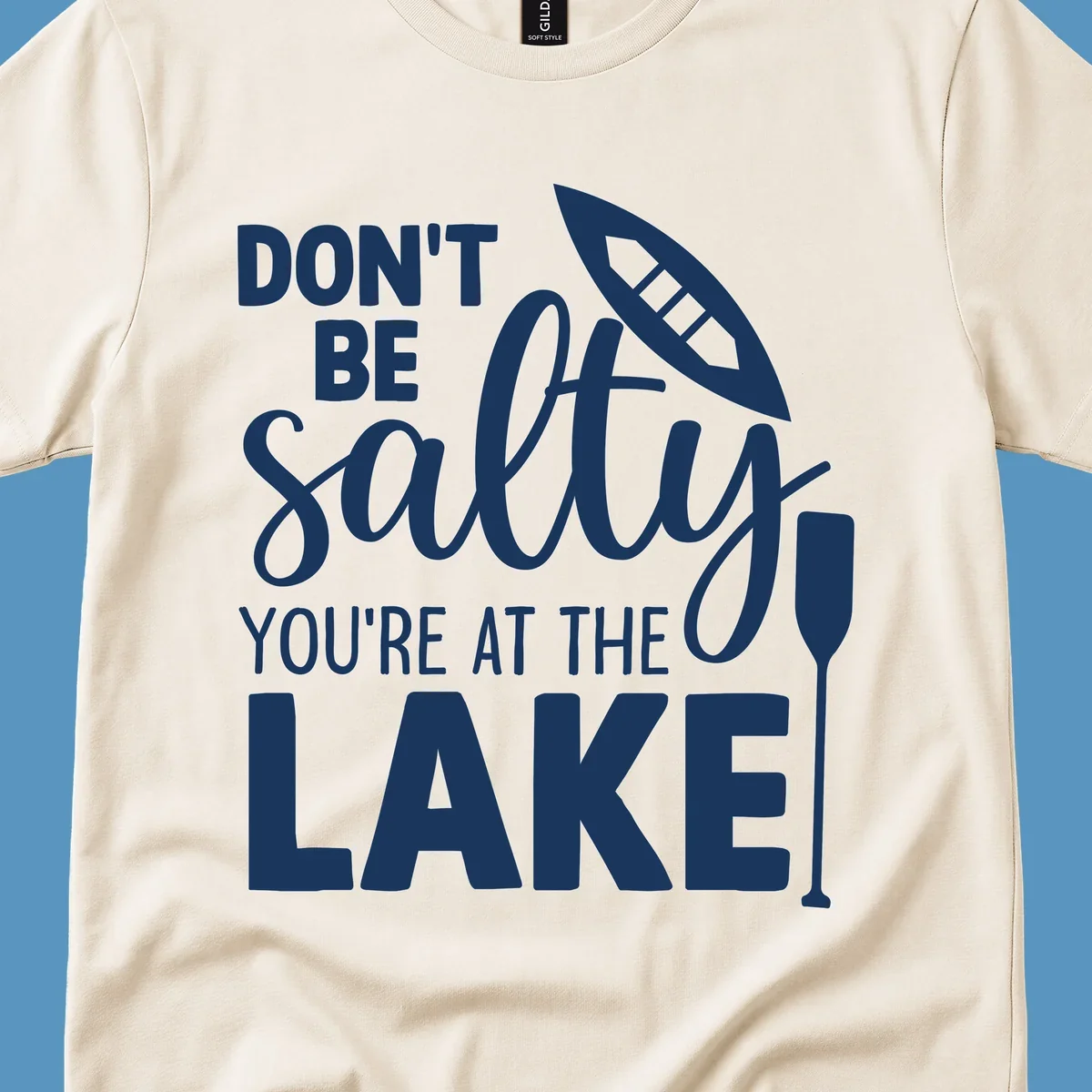 Don't be salty you're at the lake text with canoe and oar graphic.