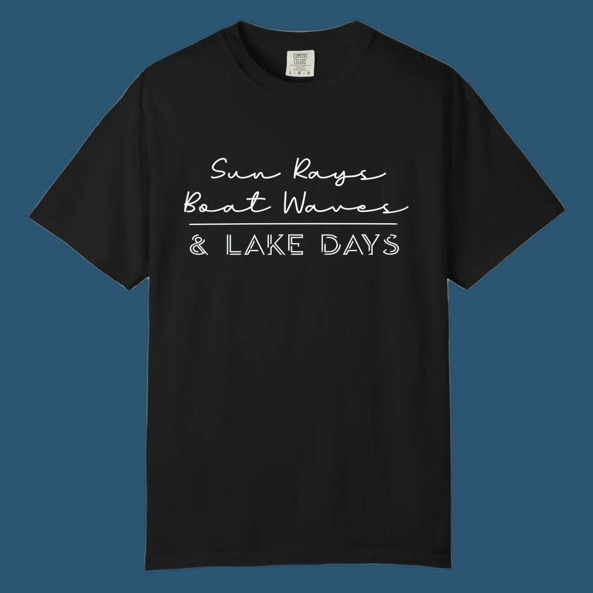 Lake days design with sun rays, boat waves, and '& LAKE DAYS' text.