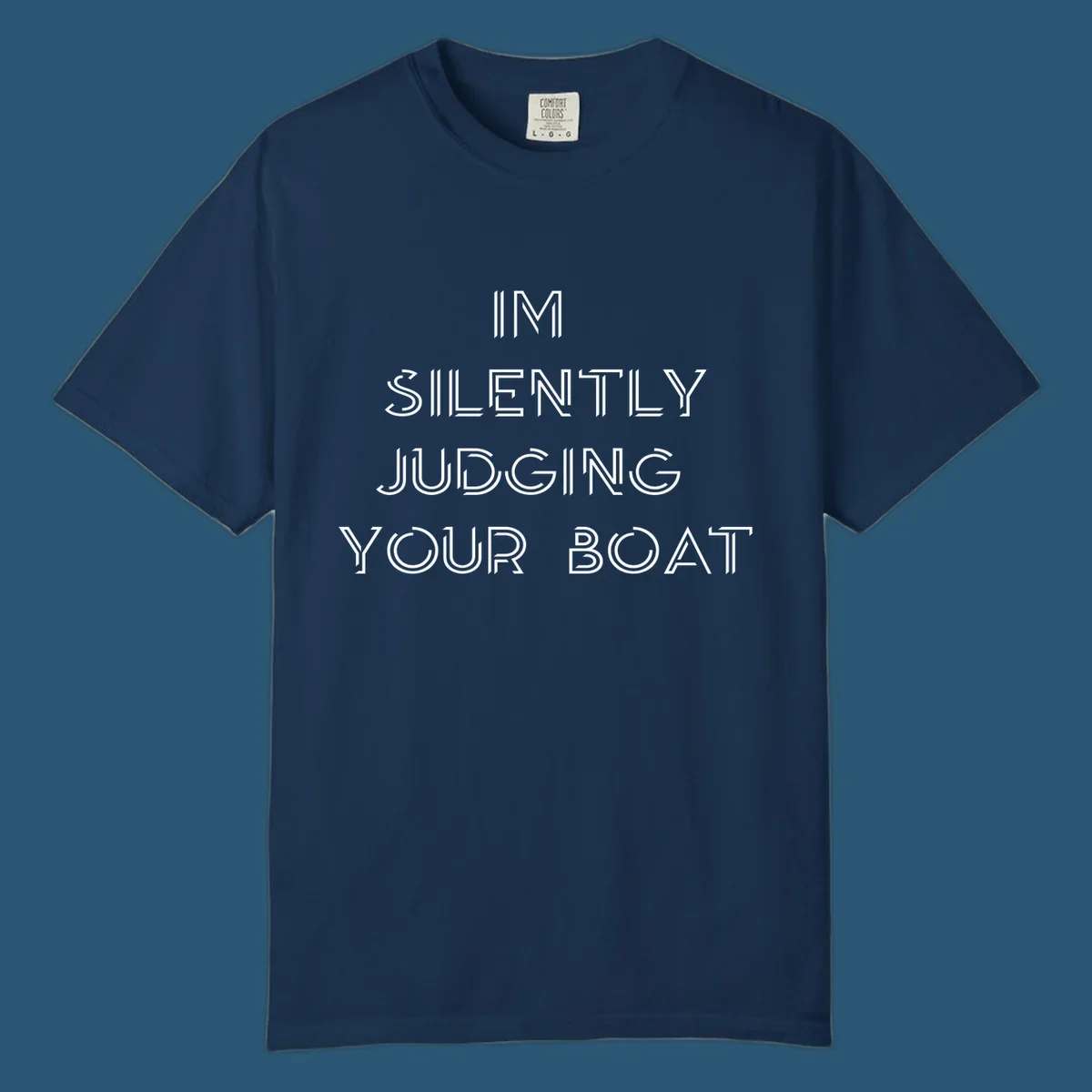 Text design 'IM SILENTLY JUDGING YOUR BOAT' in a stylized font, white on black and navy on white.
