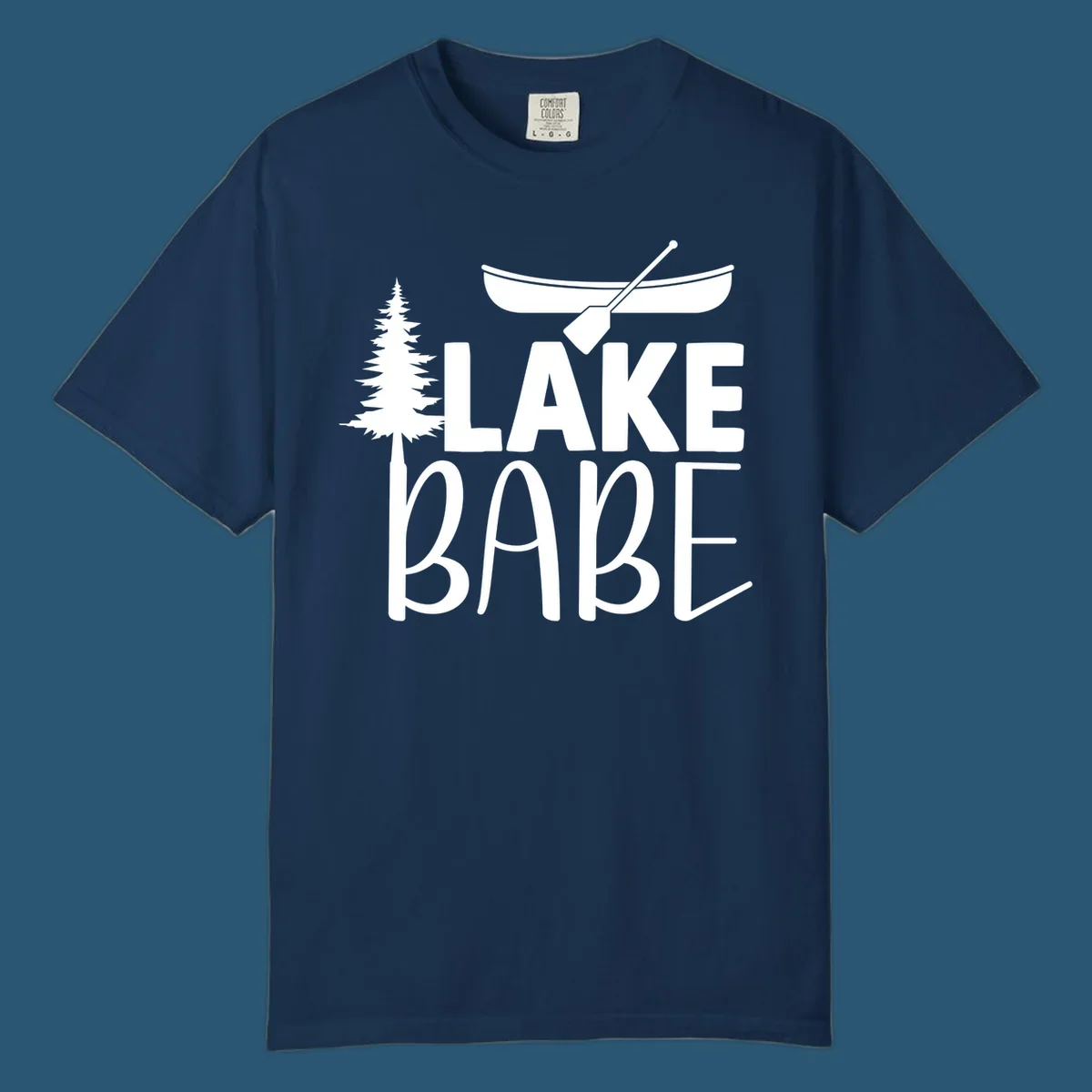 Lake Babe design with canoe, pine tree, and text. Lake-babe-style graphic.