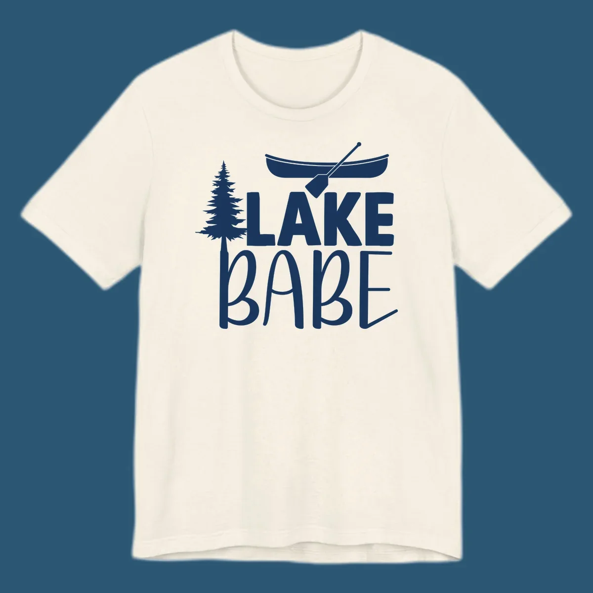Lake Babe design with canoe, pine tree, and text. Lake-babe-style graphic.