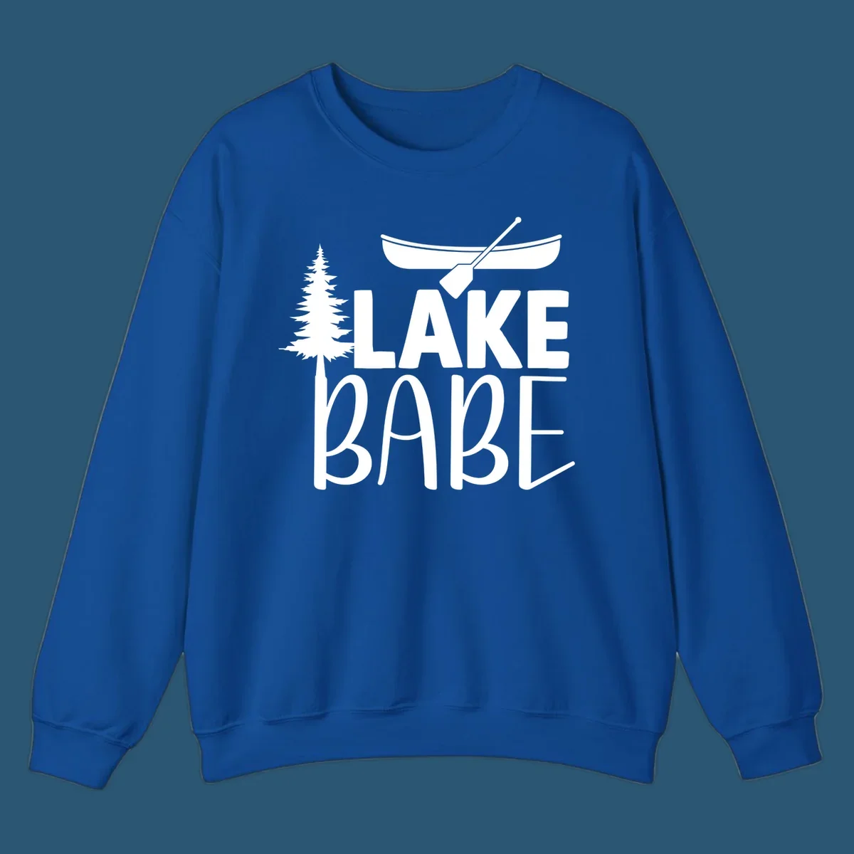 Lake Babe design with canoe, pine tree, and text. Lake-babe-style graphic.